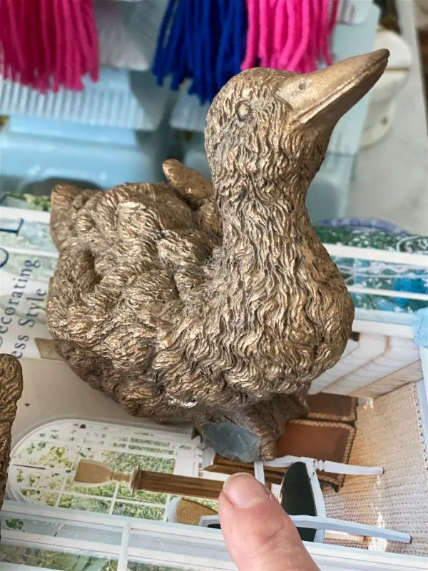 Pair of resin bronze colored ducks