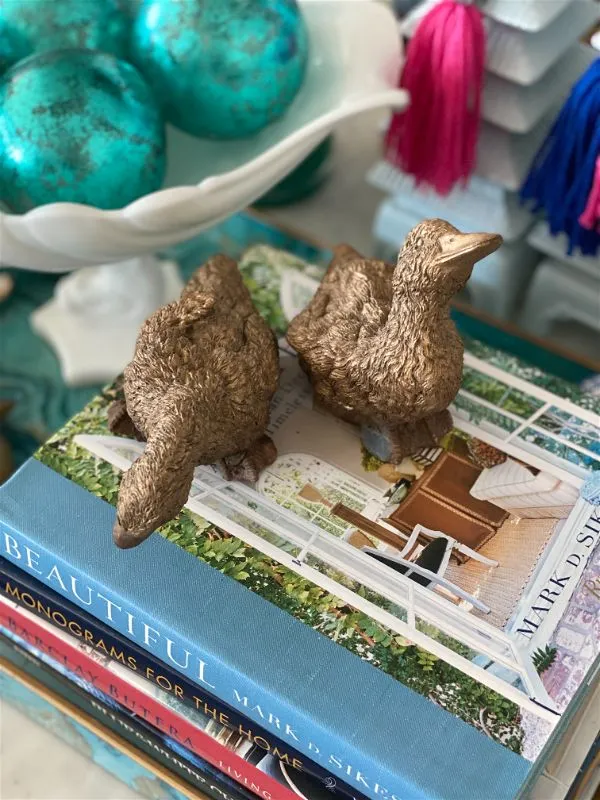 Pair of resin bronze colored ducks