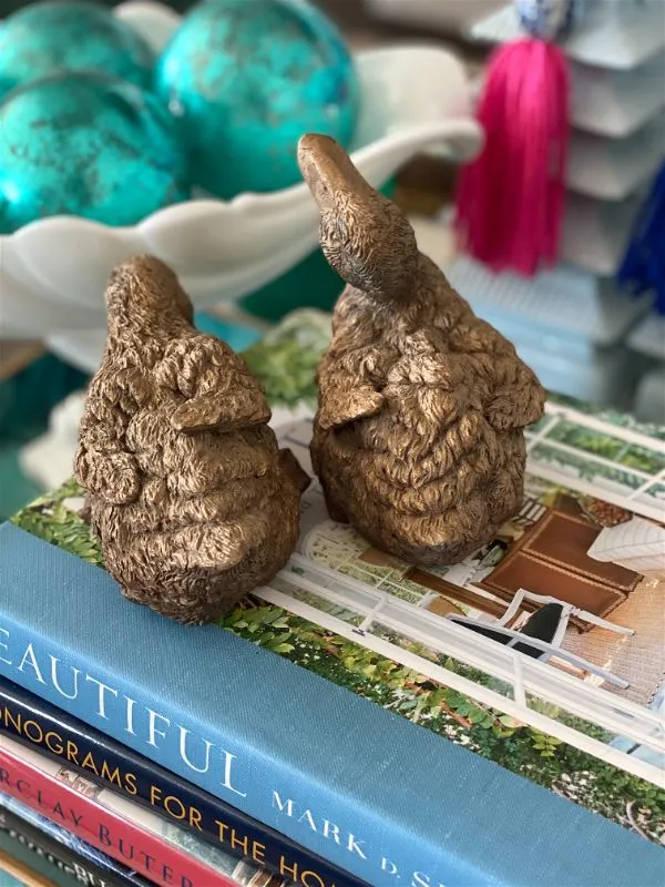 Pair of resin bronze colored ducks