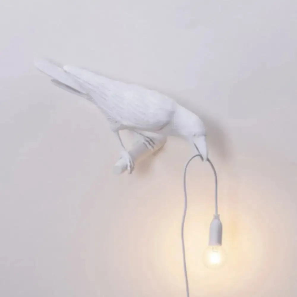 Raven Resin Wall Sconce: Artistic 1-Head Lamp with Exposed Bulb Design