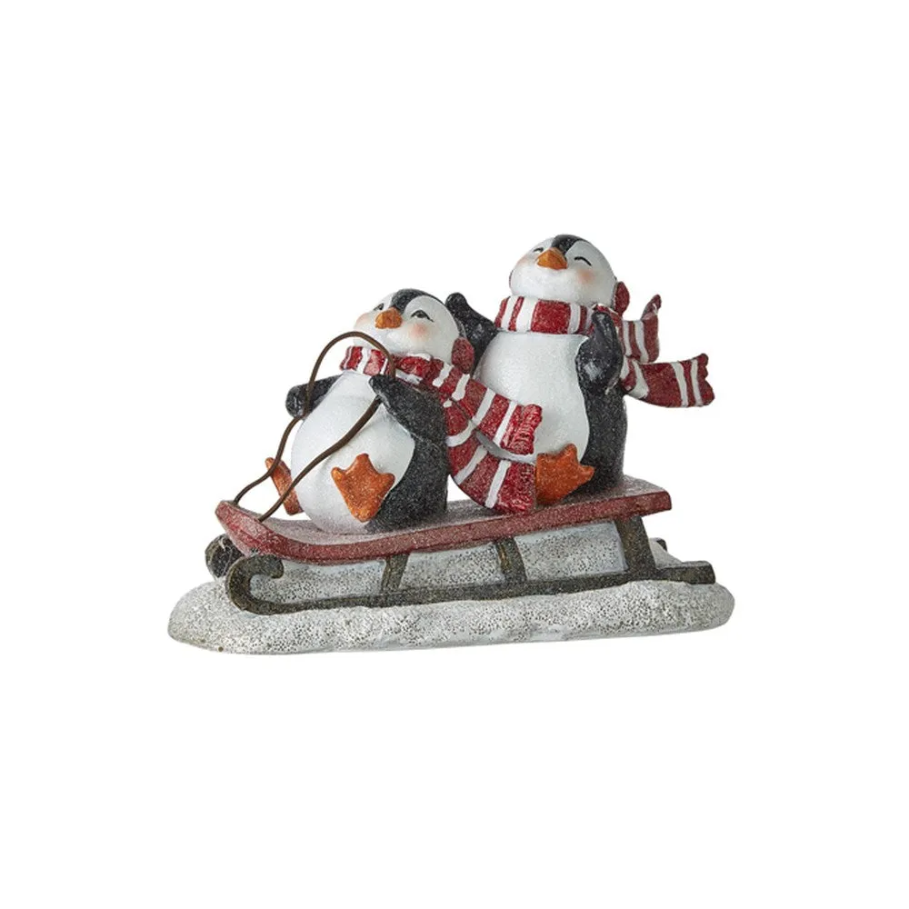 Raz Imports 2021 Snowed In 7.25-inch Sledding Penguins Figurine